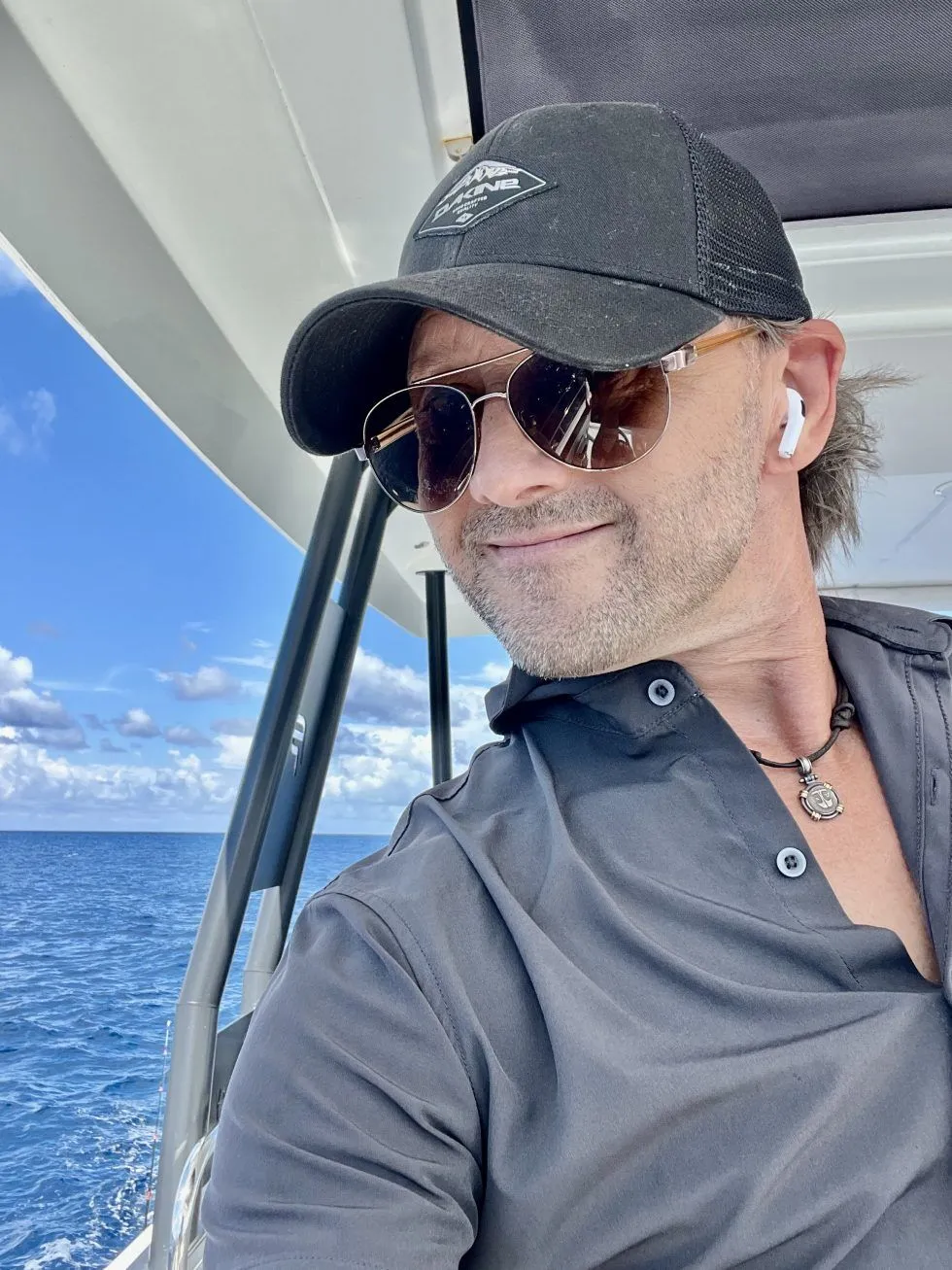 Domonic James aboard a boat